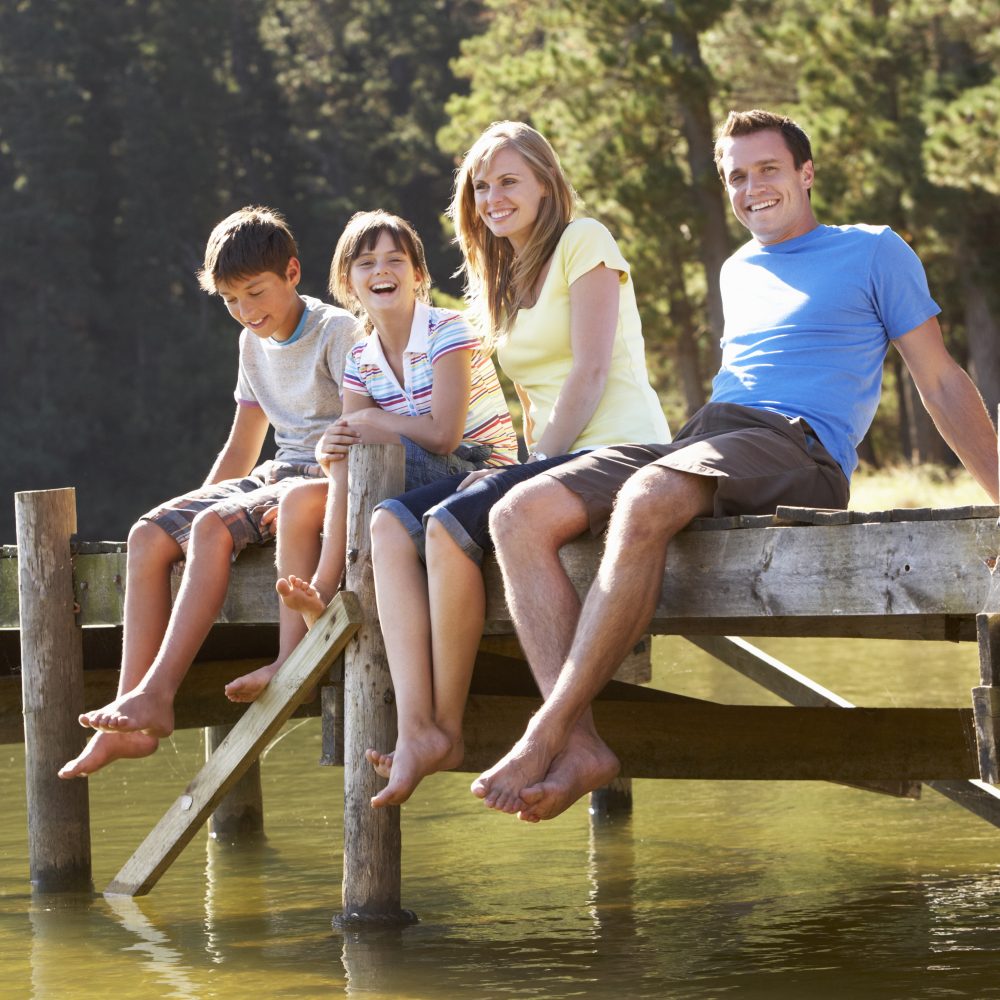 Family Sitting on the Dock
