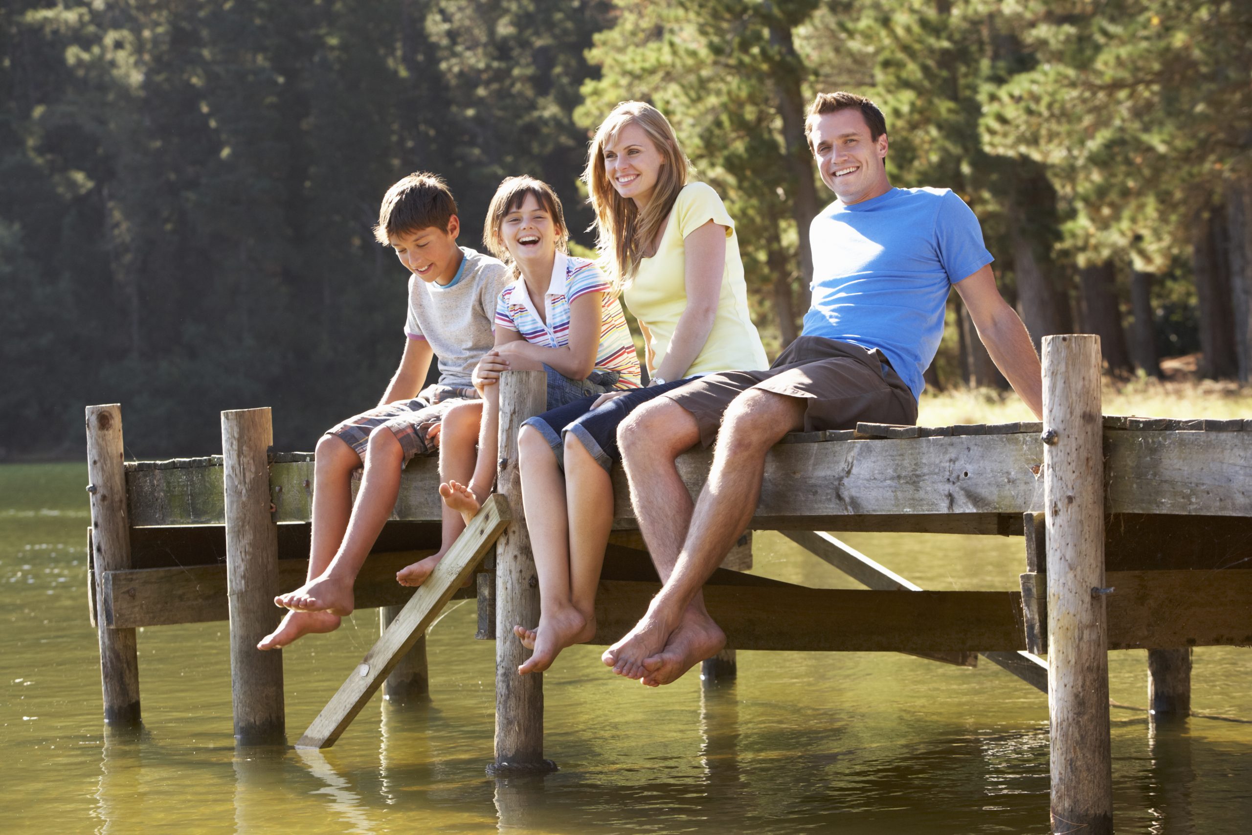 Family Sitting on the Dock
