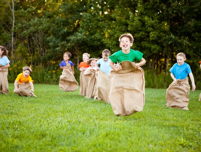 Children having Potato Sack Race